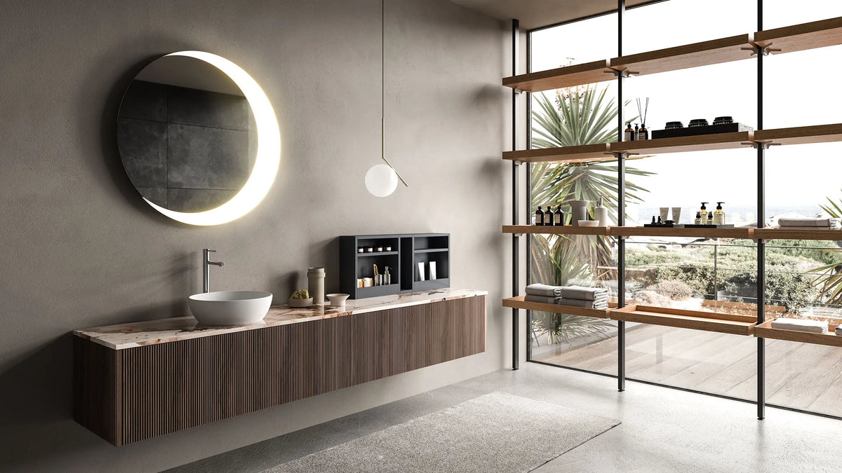 Badezimmer von ARAN mit Waschtisch aus Holz und rundem Spiegel